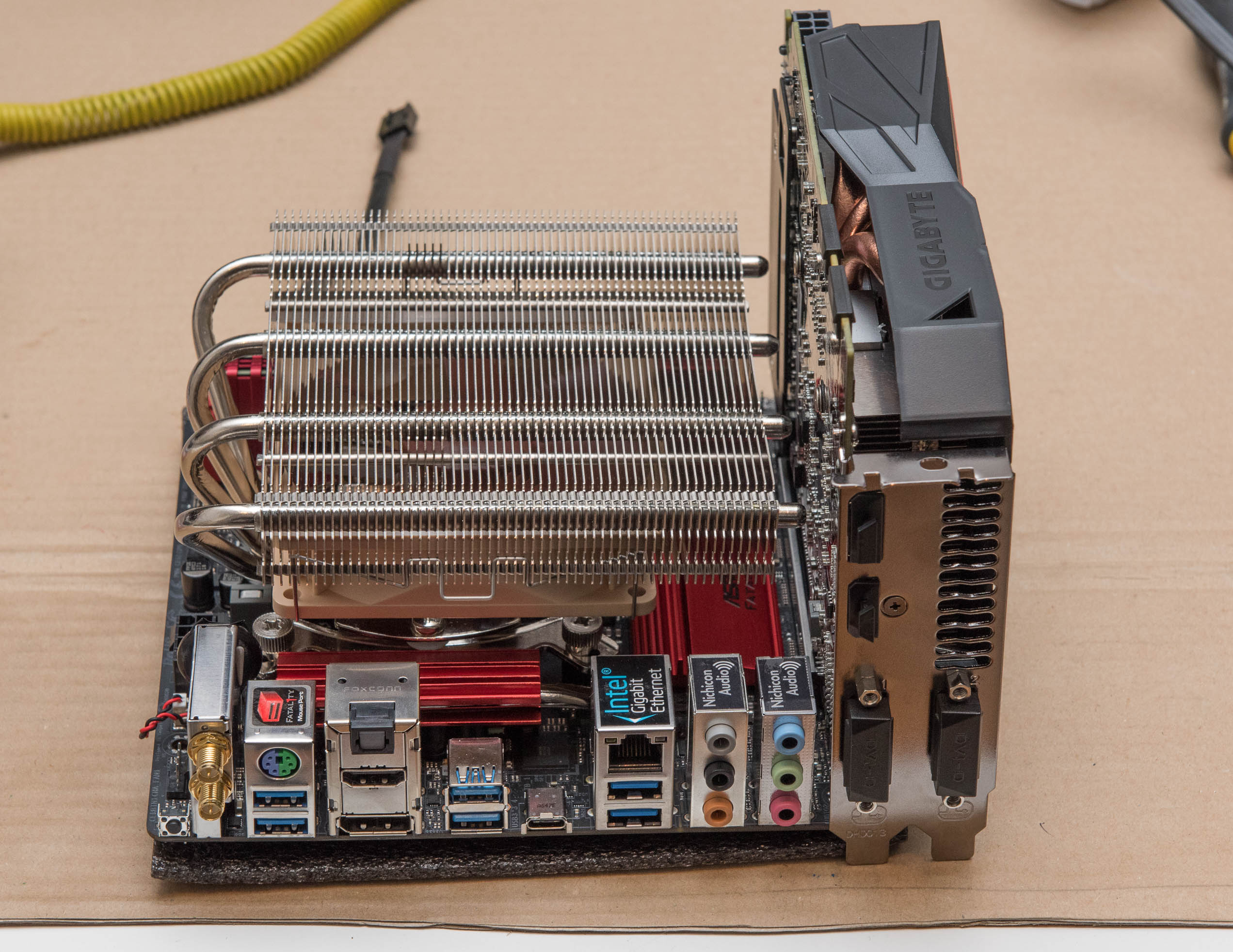 Dry fit of the ASRock motherboard, Noctua NH-L12 cooler and Gigabyte GPU